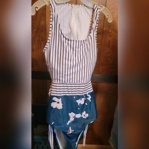Amazon one piece swimsuit. Floral and stripes. White black and green.